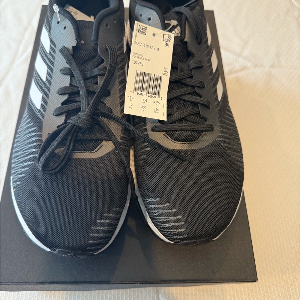 Brand new, men’s, Adidas Solar Blaze sneakers, size 12, color, black.
